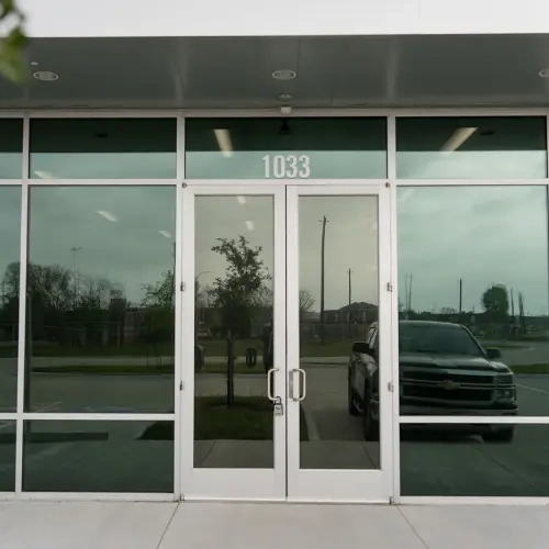 Commercial storefront with tinted glass entrance