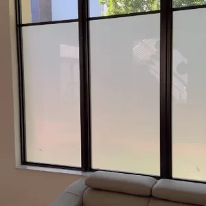 Large living room with the best window tinting in Miami FL to block harmful UV rays and protect furniture.